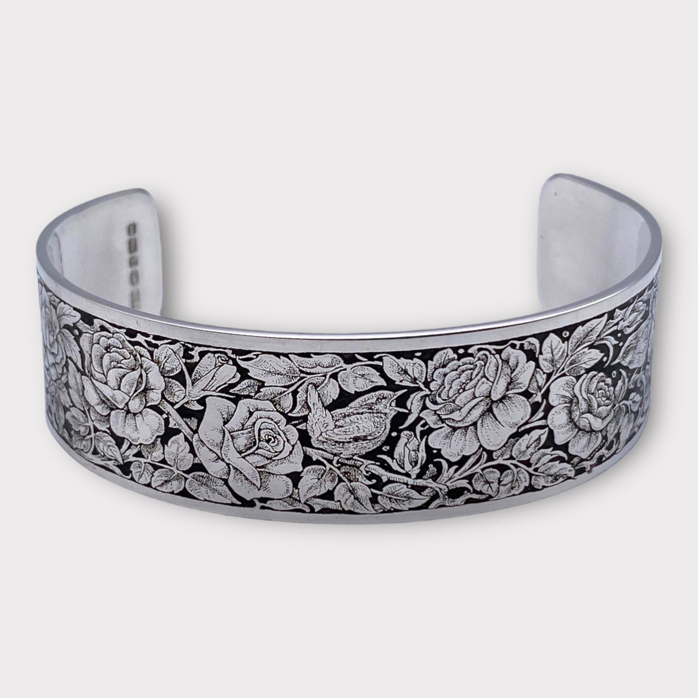 Engraved sterling silver cuff bracelet for her with english rose engraving designed by Ken Hunt