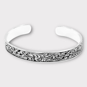 Engraved sterling silver bracelet with scroll gun hand engraving style by Ken Hunt